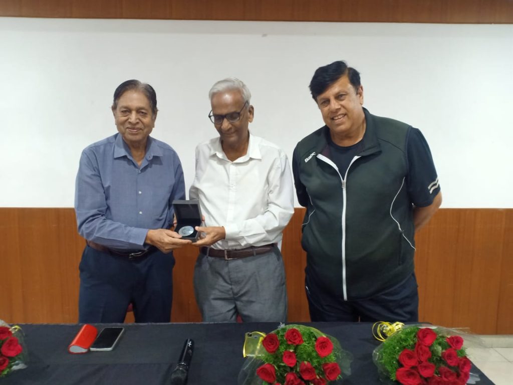 SJFI Medal presented to Harry David in Pune on Wednesday, September 4 at the PYC Gymkhana. Chandu Borde and Nandan Bal presented the medal and. citation.